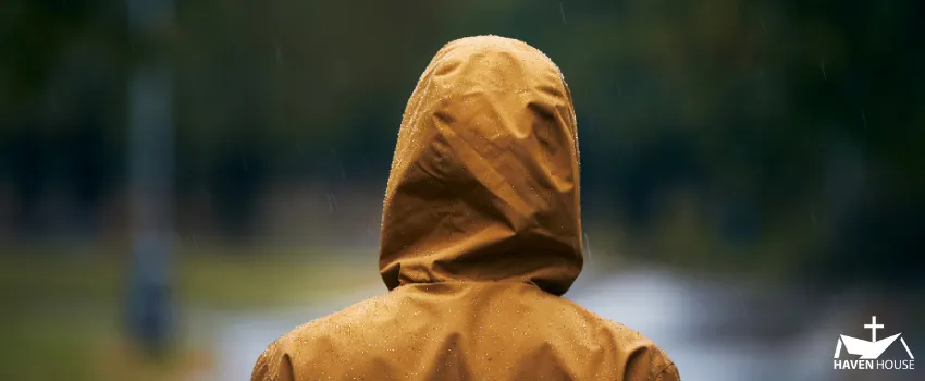 HHRC - A person in a yellow raincoat posing in its back