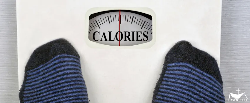 HHRC - Weighing scale with the word 'calories.