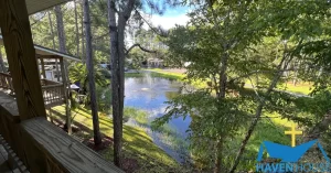 A serene pond seen from a house deck | HHRC